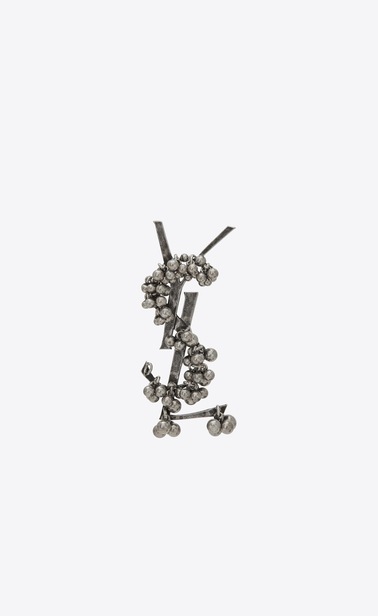 Spilla YSL Folk con sonagli in metallo argentato.